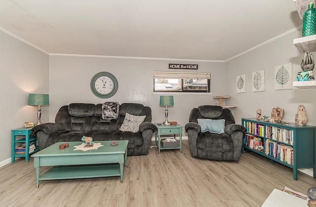 living room featuring ornamental molding, baseboards, and wood finished floors