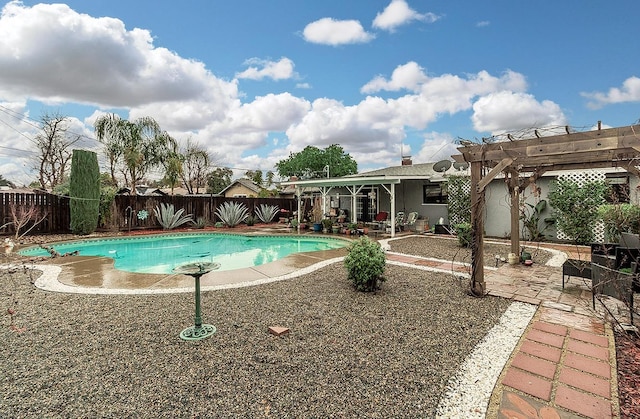 view of swimming pool with a patio area, a fenced backyard, a fenced in pool, and a pergola