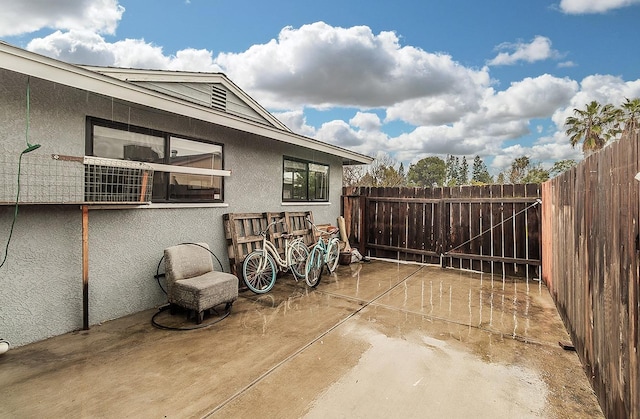 view of patio / terrace with fence