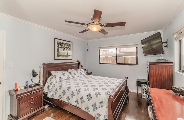 bedroom featuring ceiling fan, dark wood finished floors, and crown molding