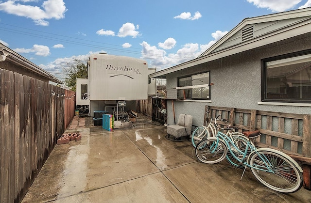 view of patio / terrace with fence