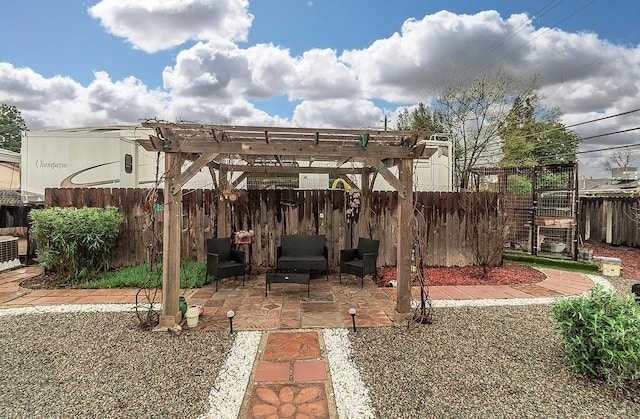 view of patio / terrace featuring fence and a pergola