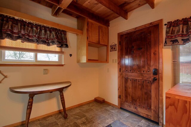 laundry area with wooden ceiling