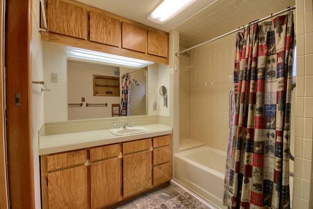 bathroom with vanity and shower / bath combo