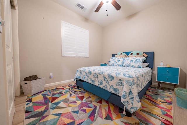 bedroom featuring ceiling fan and light hardwood / wood-style flooring