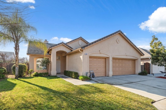 view of front facade with a front lawn and a garage