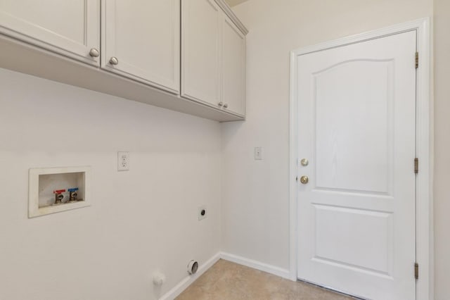 laundry room with hookup for a washing machine, electric dryer hookup, and cabinets