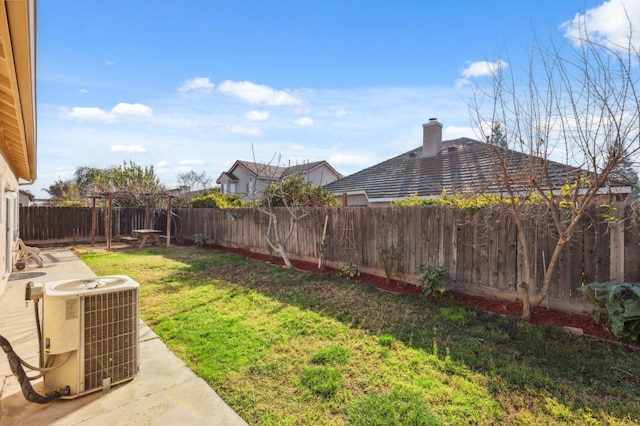 view of yard featuring central AC