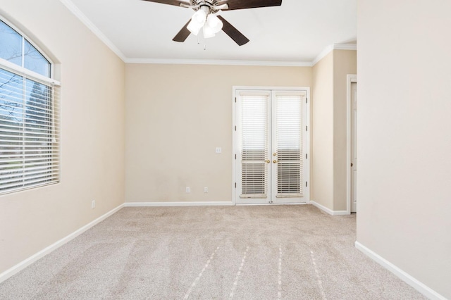 unfurnished room with ceiling fan, ornamental molding, and light colored carpet