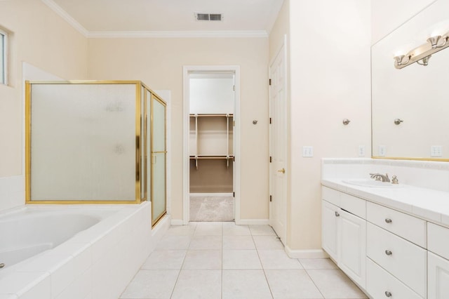 bathroom featuring independent shower and bath, crown molding, tile patterned floors, and vanity