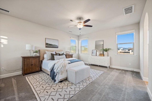 carpeted bedroom featuring ceiling fan