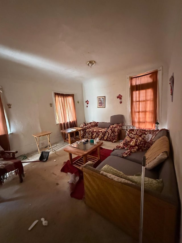 unfurnished living room with carpet flooring