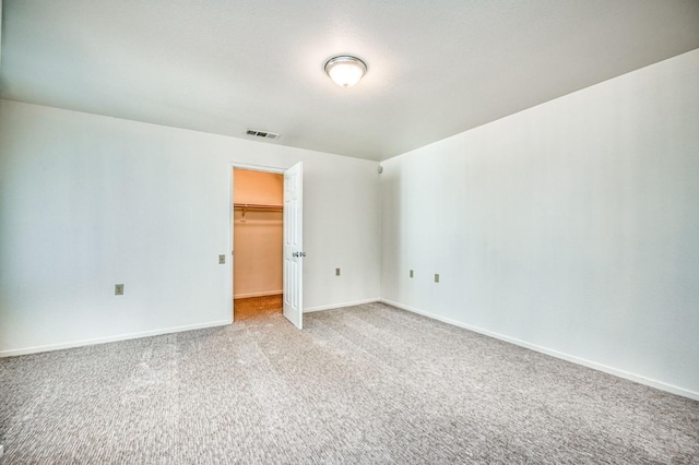 unfurnished room with carpet