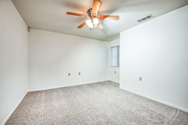 carpeted empty room with ceiling fan