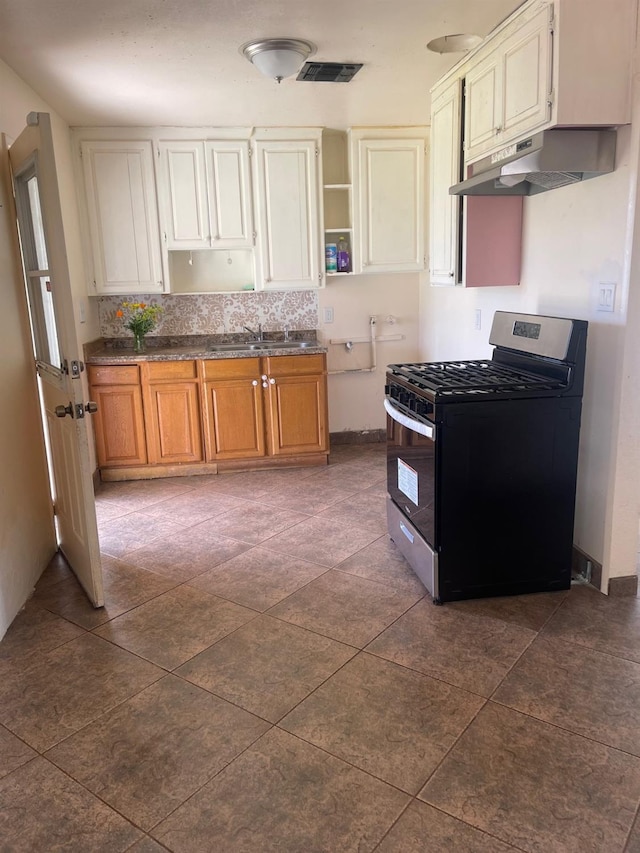 kitchen with gas range and sink