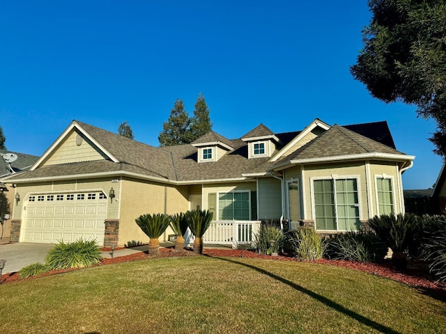 view of front of house featuring a garage and a front yard