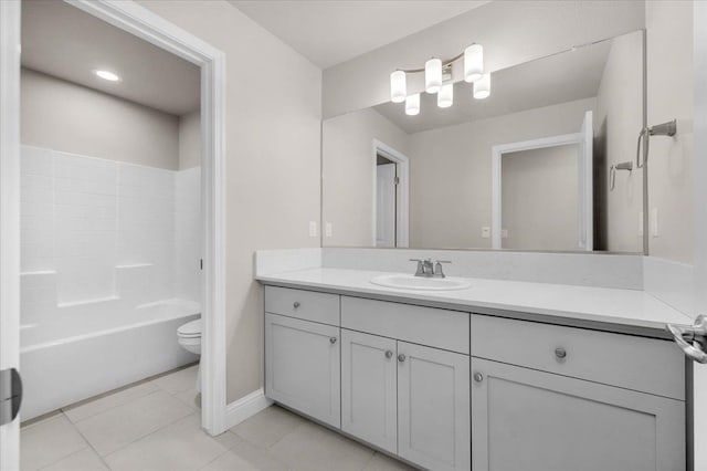 full bathroom featuring vanity, tile patterned floors, toilet, and shower / bath combination