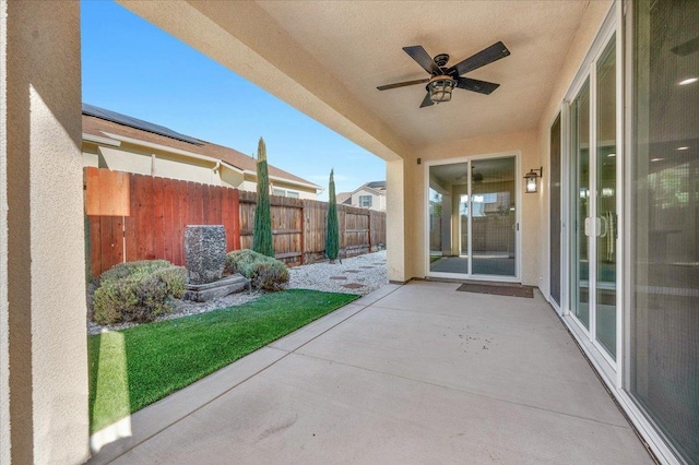 view of patio with ceiling fan