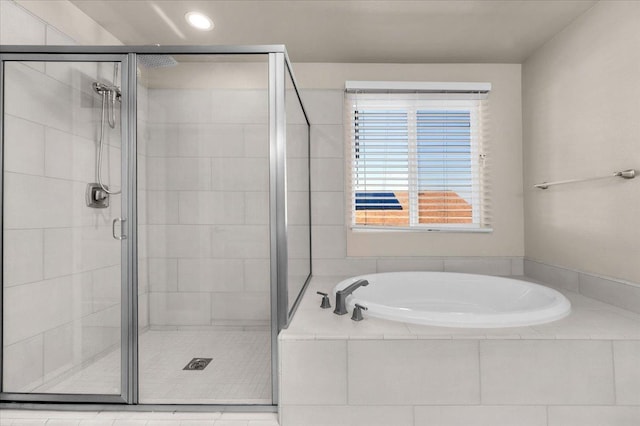 bathroom with independent shower and bath