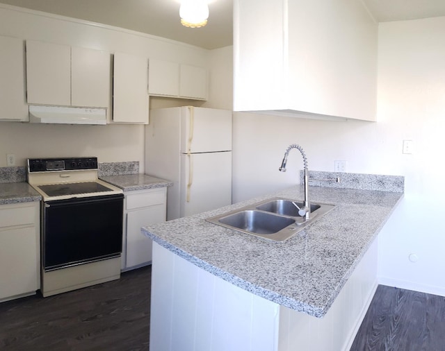 kitchen with electric stove, white cabinetry, white refrigerator, and sink