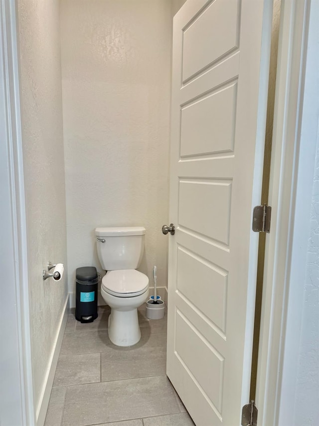 bathroom featuring toilet