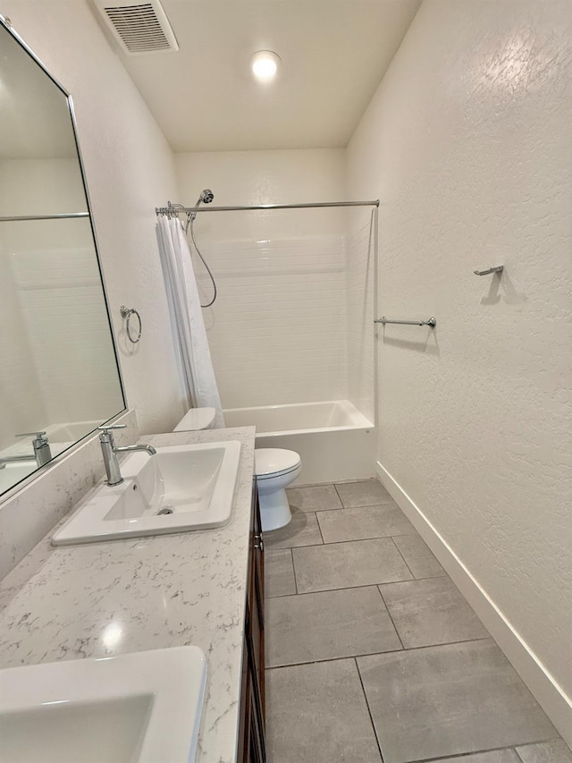 full bathroom featuring vanity, shower / bathtub combination with curtain, and toilet