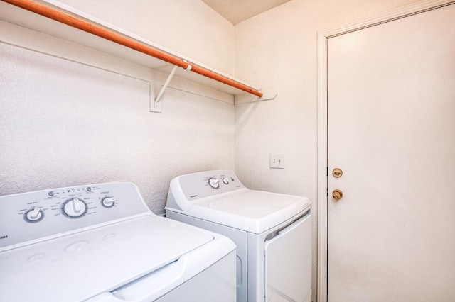 laundry room with washer and clothes dryer