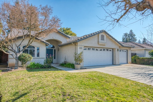 ranch-style house featuring a front yard and a garage