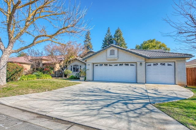 ranch-style house featuring a garage and a front lawn