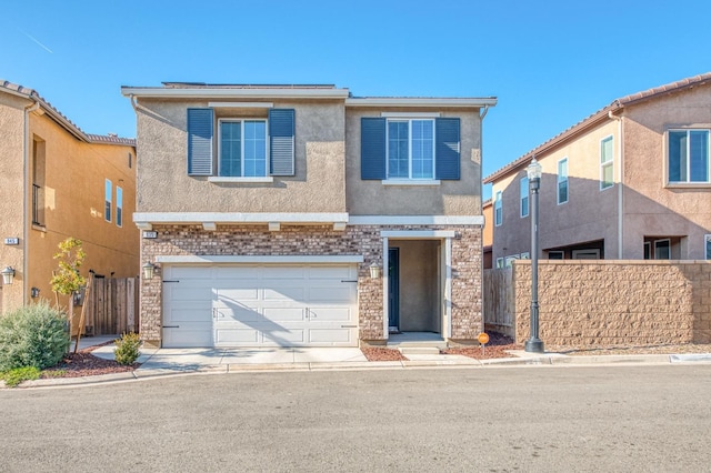 view of front of property with a garage