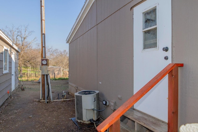 view of property exterior featuring central AC unit