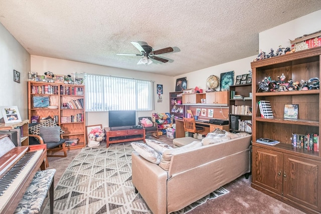 living area with carpet floors, a textured ceiling, and ceiling fan