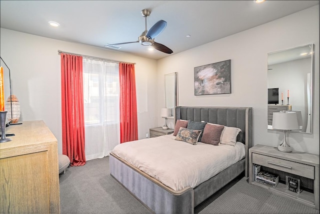 carpeted bedroom featuring ceiling fan