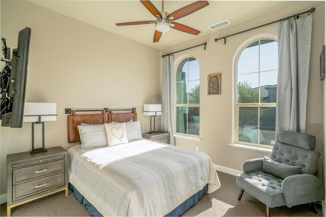 bedroom featuring ceiling fan and carpet floors