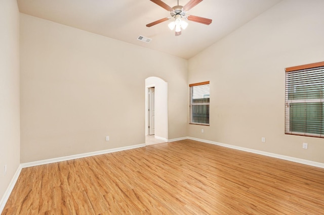 spare room with light wood-type flooring and ceiling fan