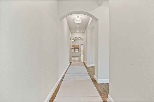 hall featuring hardwood / wood-style floors