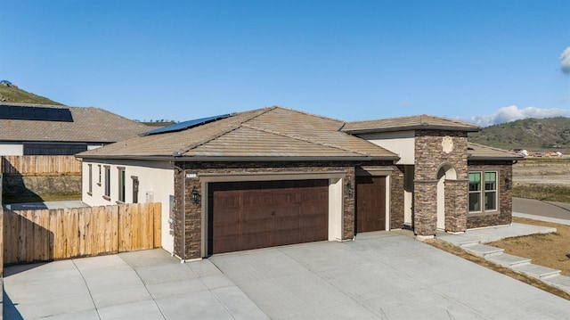 view of front of home featuring a garage