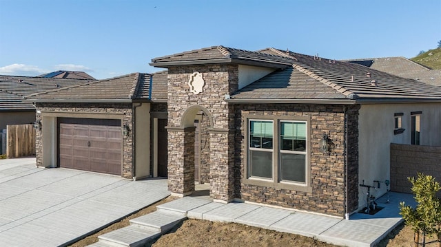 view of front of property featuring a garage