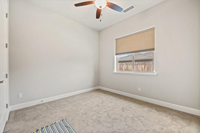 unfurnished room featuring carpet floors and ceiling fan