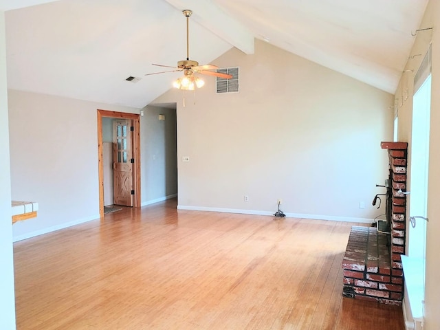 spare room with beam ceiling, wood-type flooring, high vaulted ceiling, and ceiling fan