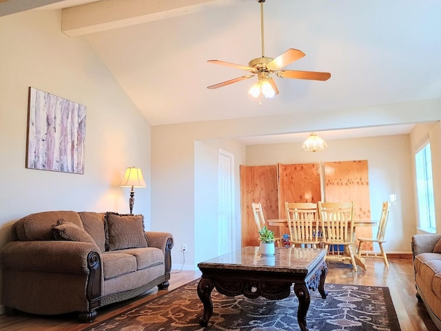 living room with lofted ceiling with beams, hardwood / wood-style floors, and ceiling fan