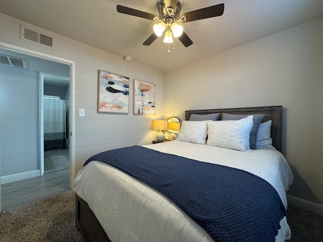 bedroom with ceiling fan and ensuite bathroom