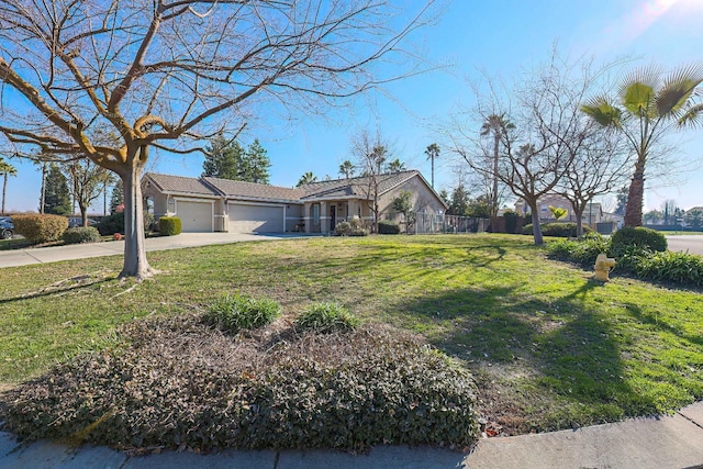 ranch-style home featuring a garage and a front lawn