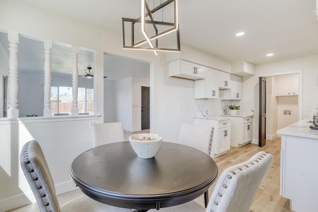 dining area featuring light wood-type flooring