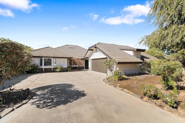 ranch-style house featuring a garage