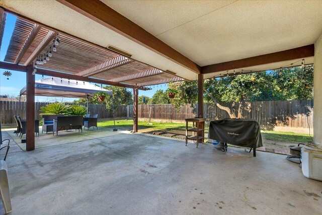 view of patio / terrace featuring grilling area and a pergola