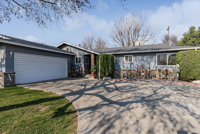 single story home featuring a garage