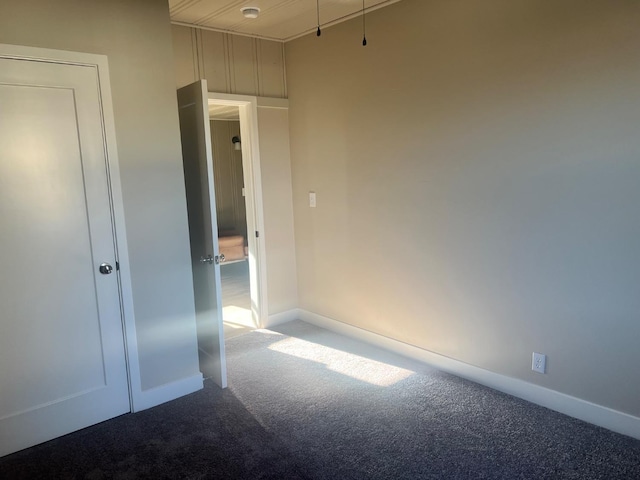 unfurnished bedroom featuring carpet flooring