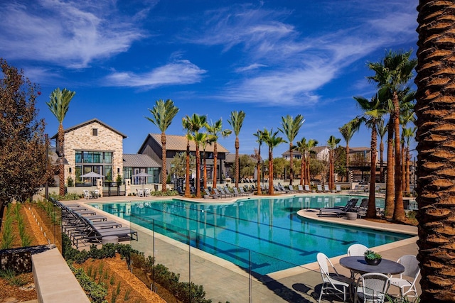 view of swimming pool featuring a patio area