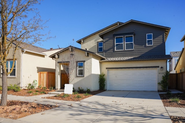 front of property featuring a garage